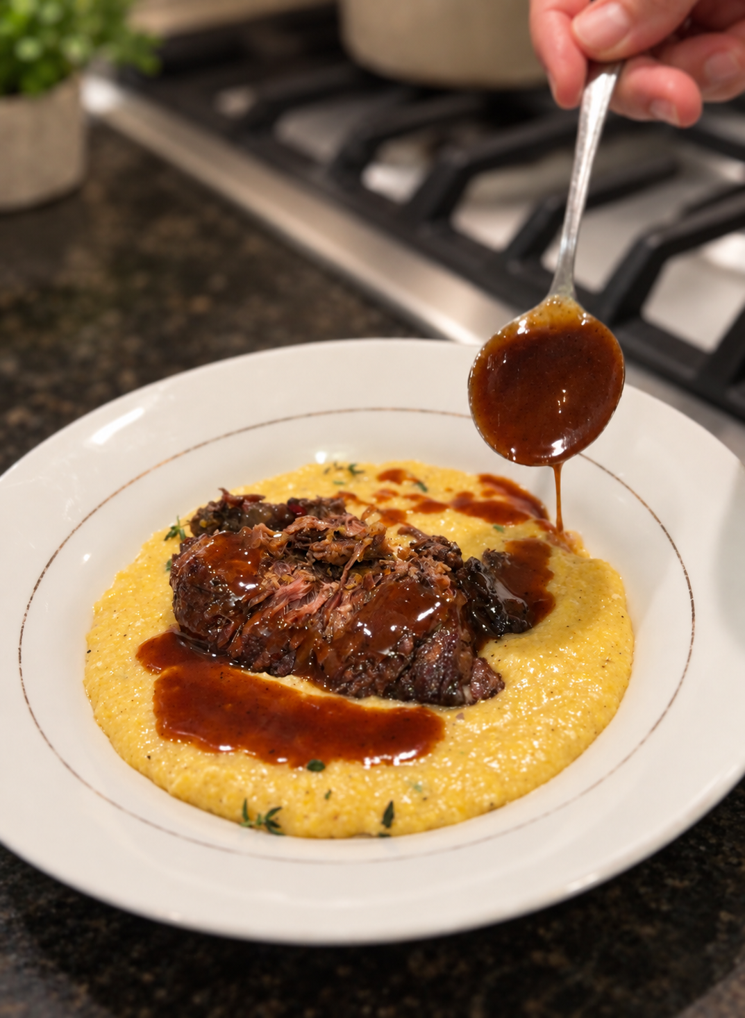 Red wine sauce spooned over Burgundy-braised short ribs and creamy Parmesan-herb polenta.